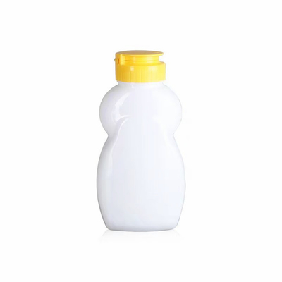 Προσαρμοσμένες σαφείς πλαστικές συμπιέσεων κανάτες 110ml μελιού μπουκαλιών επαναχρησιμοποιήσιμες μικρές